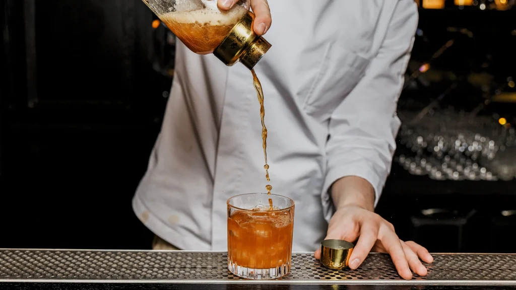 Bartender using Candid Mixers Club Soda